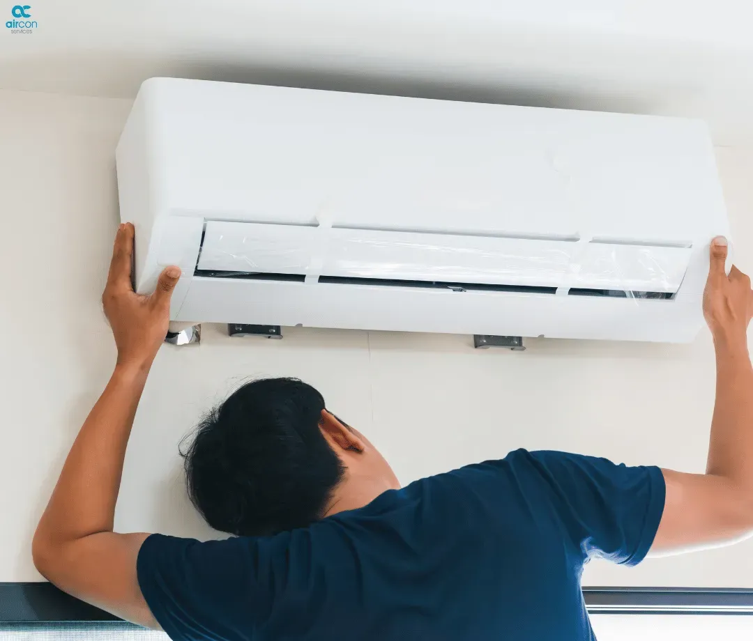 Air Con Services engineer working on air conditioning equipment